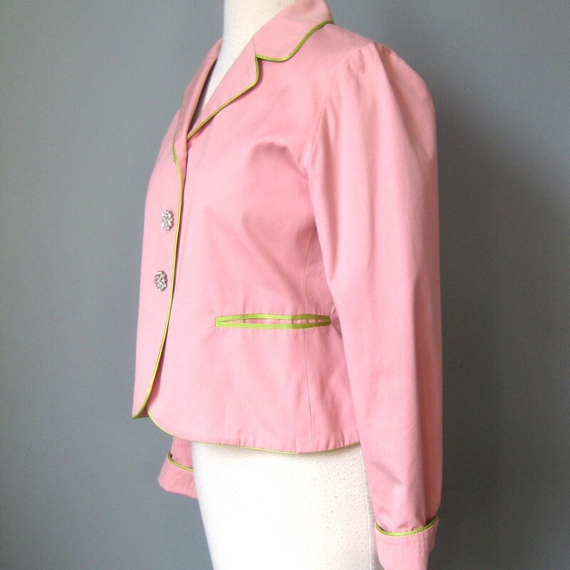 Molly B Cotton Blazer, Pink/Grn, Size: 6<br />
Chic cropped cotton blazer made Molly B.<br />
Pastel pink with green trim at the edges and fancy round rhinestone buttons.<br />
Fully lined<br />
<br />
Marked size 6<br />
Flat measurements:<br />
Shoulder to shoulder: 15.25<br />
Armpit to armpit: 19<br />
Length: 20<br />
Underarm sleeve seam length: 18.75<br />
<br />
Perfect condition!<br />
<br />
thanks for looking!<br />
#1374