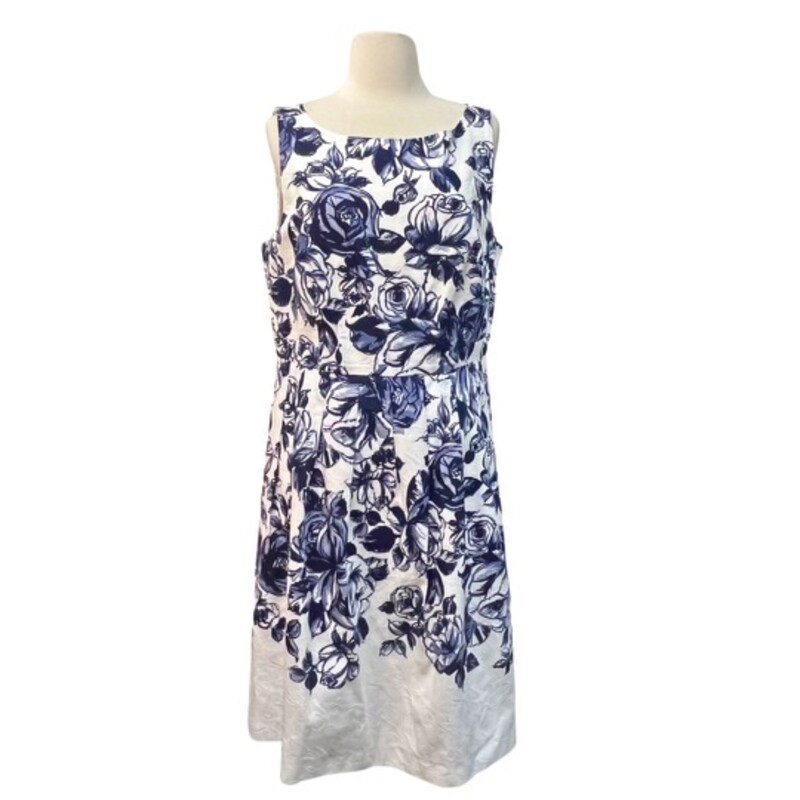 NEW Talbots Floral Dress<br />
Has pockets<br />
Lined<br />
Textured fabric<br />
Navy and White<br />
Size: 12