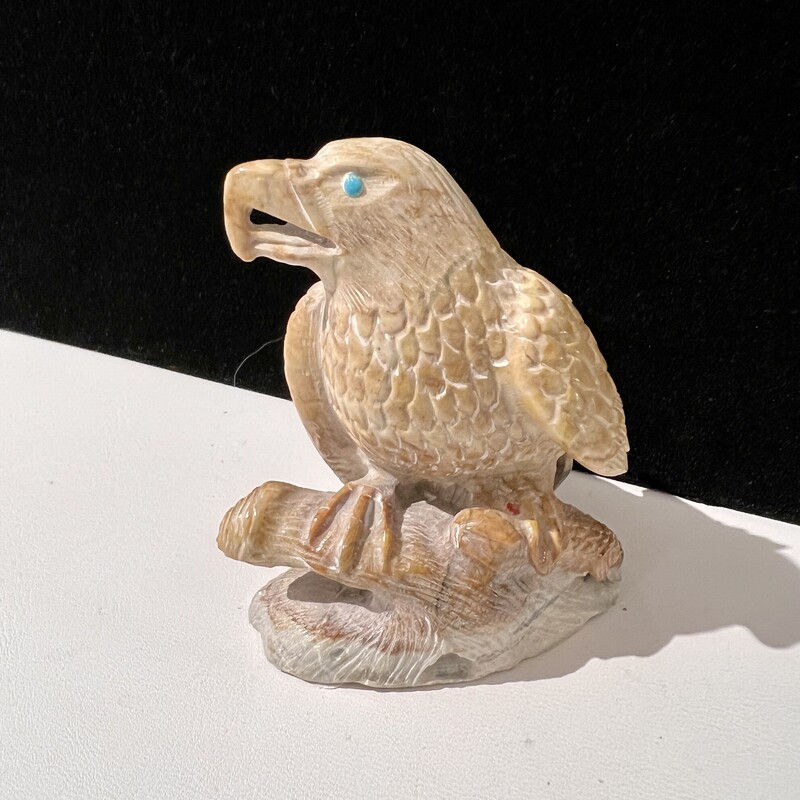 Stone blue-eyed Eagle Carving