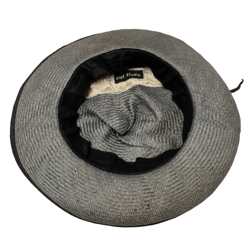 Viat Studio Hat<br />
These fun, functional, and packable sun hats are custom-designed and handmade in Seattle from the finest imported woven straw<br />
Each Viat hat is individually sculpted, stitched, and hand-dyed.<br />
Gray