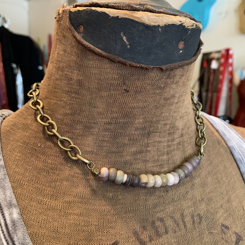 This beautiful necklace is on a 16 inch chain with a 2 inch extender chain!