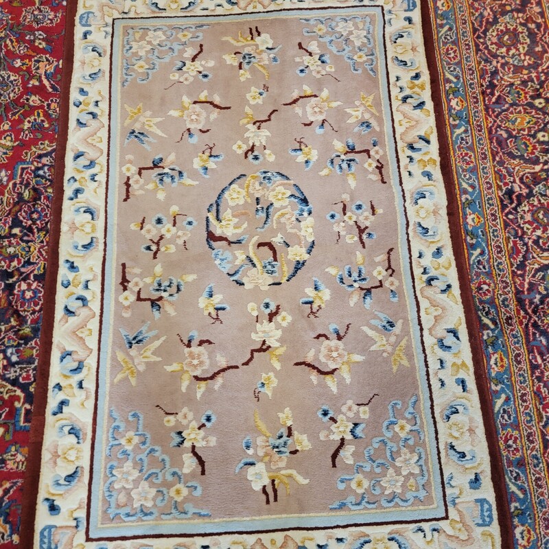 Hand Knotted Wool Floral Carpet  with minor wear.  Excellent qaulity carpet!  Measures 5'11' by 3'6'.