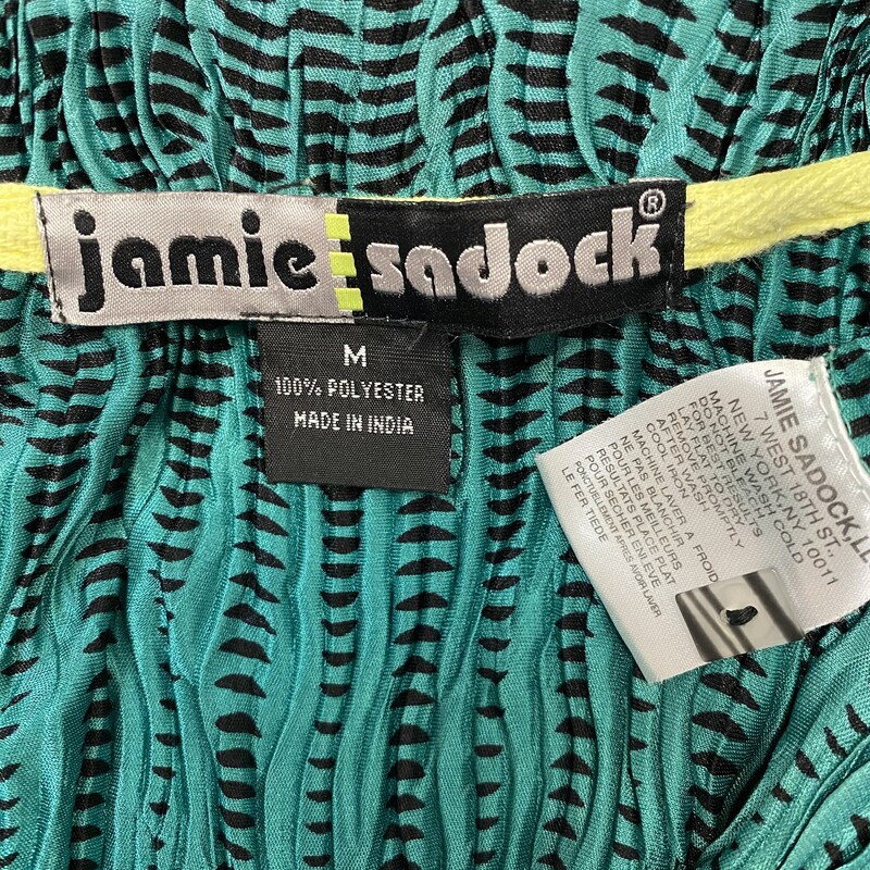Jamie Sadock Zip Top
Kelly Green and Black
Size: Medium

This Top would pair well with the Jamie Sadock Zip Jacket also listed