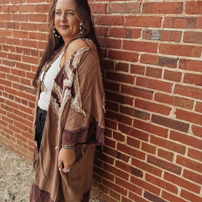 This stunning kimono is high quality and one of a kind! Layers of stitched stars make this piece one that turns heads! The mocha color is so perfect just in time for fall!