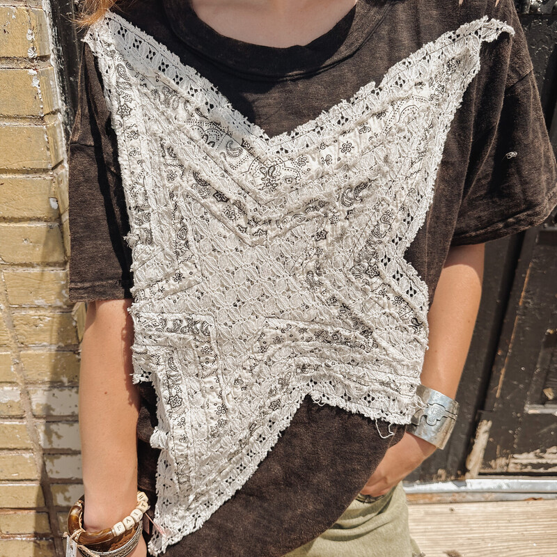 This distressed top is so unique! So soft and so stylish! With a patchworked star on the front, this distressed shirt is a stand out piece!