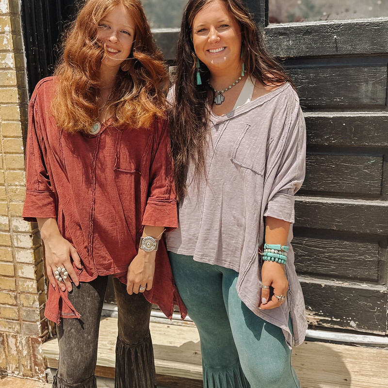 These comfy slouchy tees are the perfect top to throw on and go! Pair it with one of our bralettes, and you are set and in style- not to mention comfy!<br />
Madison (purple) is wearing size M/L and Anna (red) is in size S/M.<br />
These do run oversized!!!