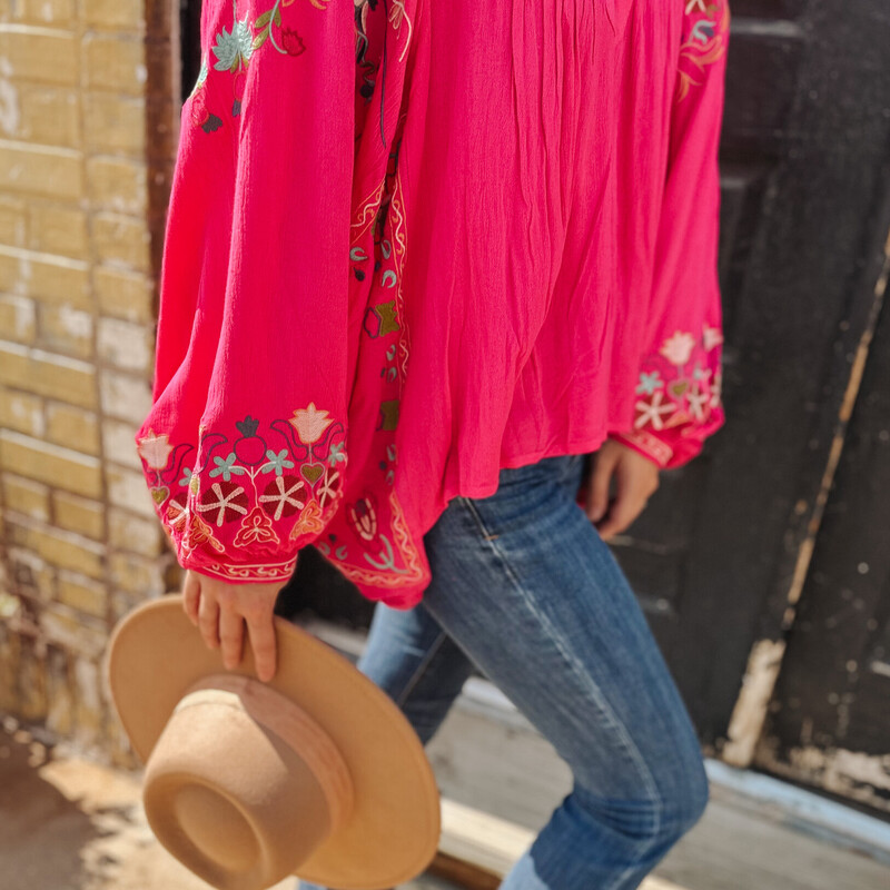 This cute Embroidered Top is available in two stylish colors, Mocha and Fushia. Perfect to throw with a pair of dress pants and wear to work, or to wear with jeans on a night on the town. Available in sizes Small, Medium, and Large.