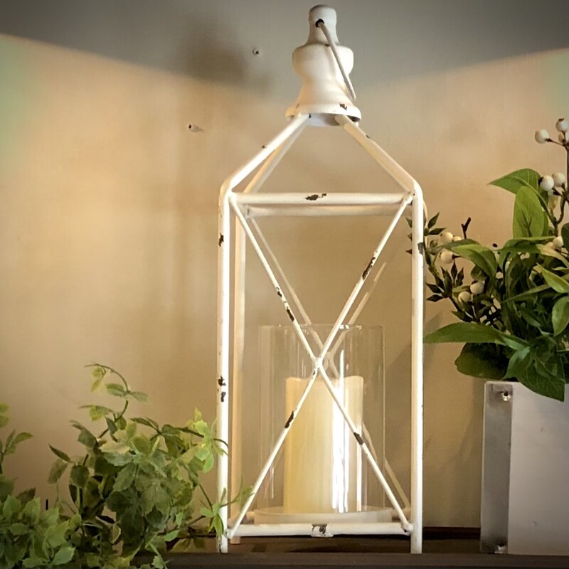 Farmhouse Lantern
16 H x 6 W x 6 D
This lantern isn't just about illumination, it's a storytelling piece too! The farmhouse lantern design evokes images of simpler times and heartwarming gatherings, where stories were shared and memories were made.