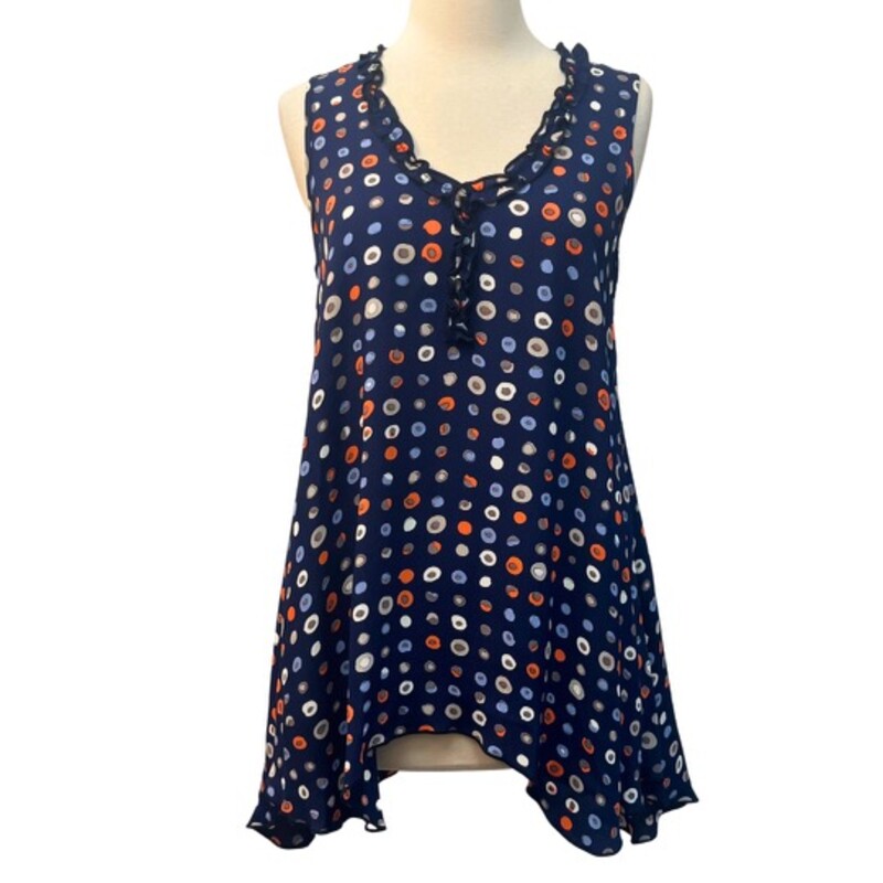 Loco Lindo DotsTunic Top<br />
Sleeveless<br />
Ruffled Neckline<br />
100% Rayon<br />
Navy, Coral, Blue, Beige, Mocha, and White<br />
Size: Small