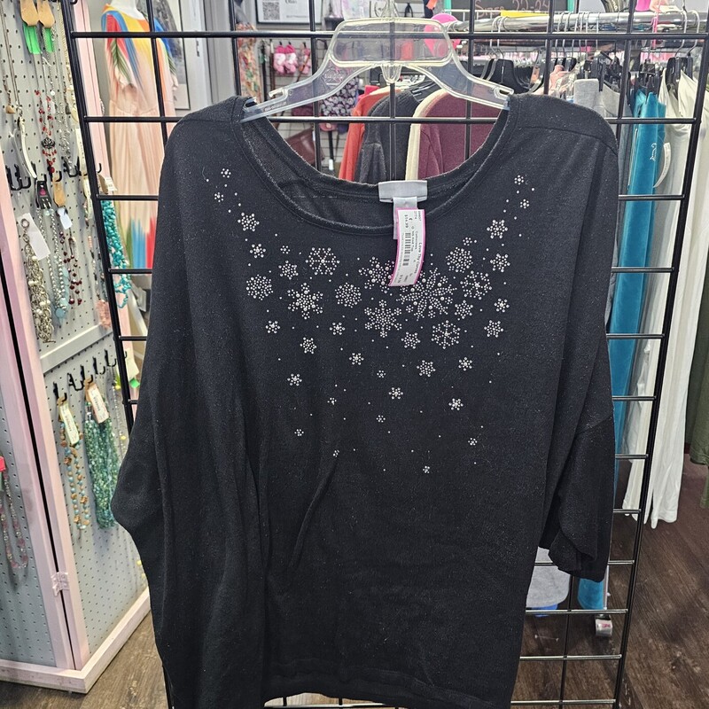 Perfect all winter long, this half sleeve knit top is black with silver blinged out snow flake design