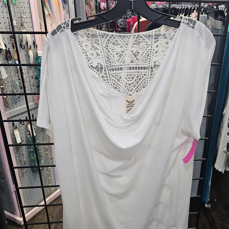 White tee that comes alive with the lace panel on the back.