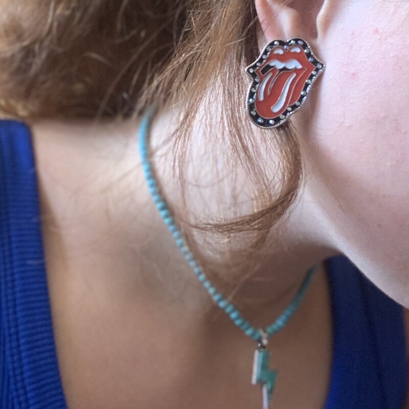 How fun are these earrings! These make any ordinary band tee a whole look!