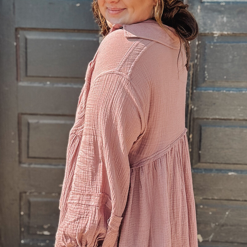 These gorgeous tops come in a lovely mauve color and are made of the very popular gauze material with frayed hems! This is a staple piece!
Madison is wearing a size Large.