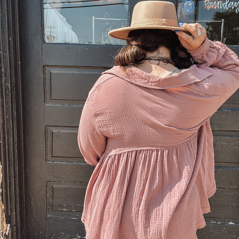 These gorgeous tops come in a lovely mauve color and are made of the very popular gauze material with frayed hems! This is a staple piece!<br />
Madison is wearing a size Large.