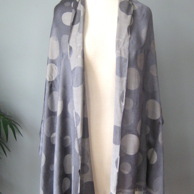 Here is a very large oblong scarf.<br />
Pashmina style with a tonal double circle pattern in the silk viscose blend fabric<br />
small fringe at each end<br />
<br />
The large size makes it quite versatile!<br />
<br />
68 x 24.5<br />
<br />
excellent pre-owned condition.<br />
<br />
Thanks for looking<br />
#3106