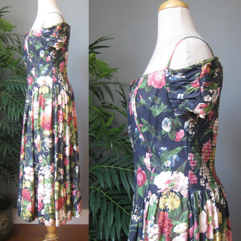 Vtg Karin Stevens Floral, Navy, Size: 8
Extravagantly feminine dress from the 1980s by Karin Stevens.
100% cotton off the shoulder ankle length dress
Beautiful floral pattern with a navy blue base and large pink and white flowers
Boned renaissance point bodice with thin straps and boned stand away little ruched sleeves.
The bodice has smocked elastic all around the sides and the back.  This will make is super comfortable and help it stay in place (the boning is a big help with that too)  Make sure it fits snugly around the body to ensure a pretty fit.  You should be fine if your bust and waist measurements work with the flat measurements provided below.
Sweetheart neckline
Pockets!
Very full skirt
unlined
Made in the USA
tag says dry clean but you can machine wash, no problem.  use gentle cycle

This would be a fabulous maid of honor dress and would look even more amazing with a crinoline underneath!

Here are the flat measurements, please double where appropriate:

Armpit to armpit: 16 stretches comfortably to -18.5
Waist: 15.5 stretches comfortably 16.5
Hip: free
Length: 49

Great condition.  The elastic is in good shape, not as snappy as it probably when the dress was made but still doing the job of hugging this dress to your torso.

Thanks for looking!
#3591
