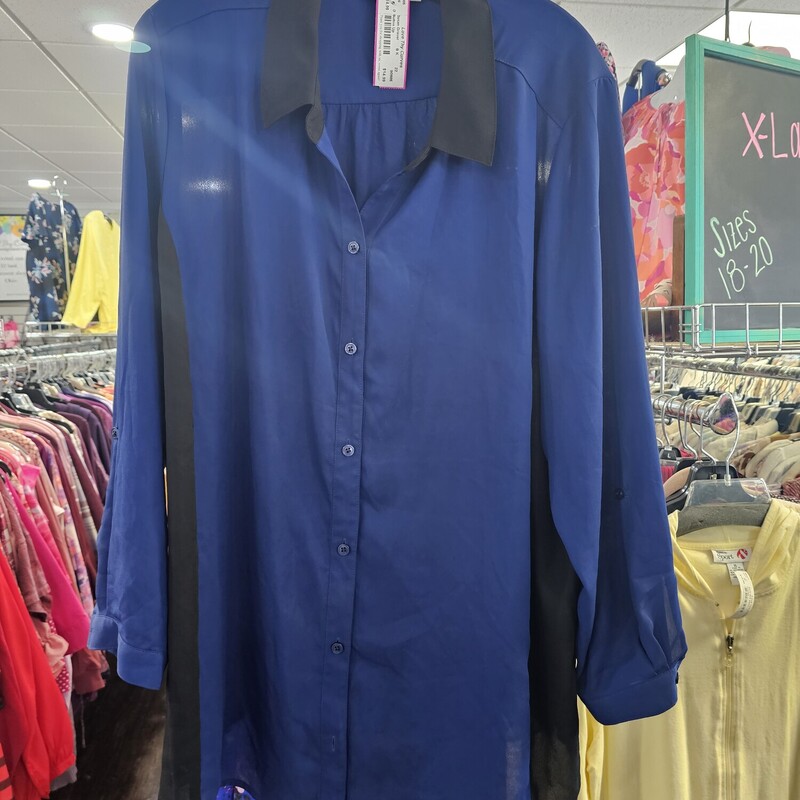 Love this sharp button up blouse in a deep blue and black color. Long sleeves that can be cuffed for versatility.