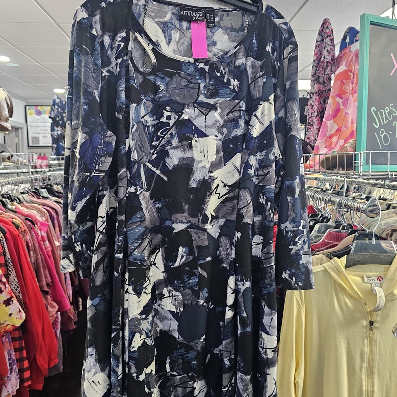 Cute flair out waisted blouse in black, blues, grey and white abstract print with half sleeves.
