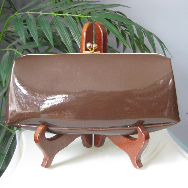 Vtg Letisse Patent Clutch, Brown, Size: None<br />
Simple yet stylish and big enough for your phone.<br />
Brown patent leather with some stitching on the front.<br />
Gold tone kisslock frame<br />
8 x 4<br />
<br />
excellent vintage condition.<br />
<br />
thanks for looking!<br />
#3396
