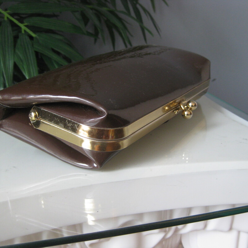 Vtg Letisse Patent Clutch, Brown, Size: None
Simple yet stylish and big enough for your phone.
Brown patent leather with some stitching on the front.
Gold tone kisslock frame
8 x 4

excellent vintage condition.

thanks for looking!
#3396