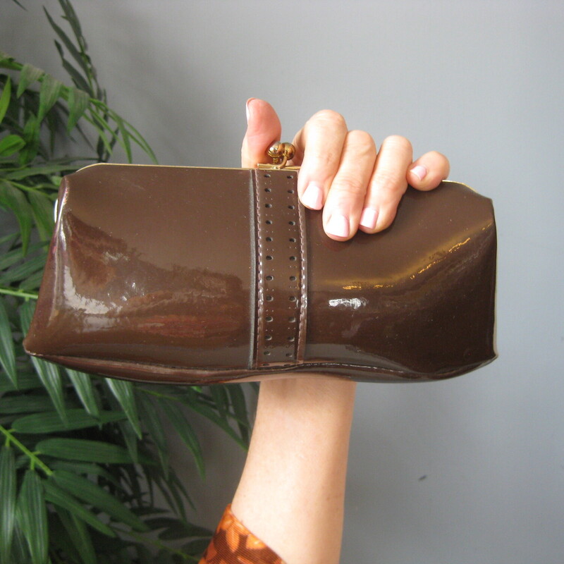 Vtg Letisse Patent Clutch, Brown, Size: None<br />
Simple yet stylish and big enough for your phone.<br />
Brown patent leather with some stitching on the front.<br />
Gold tone kisslock frame<br />
8 x 4<br />
<br />
excellent vintage condition.<br />
<br />
thanks for looking!<br />
#3396
