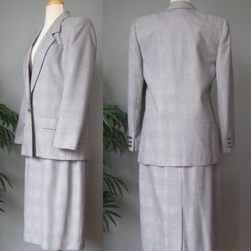 This is a nice Worhtington suit from the 1980s.    Standard cut and very good quality
Poly/rayon blend in a black and white glen plaid check pattern.
Jacket:
Single button vented built in shoulder pads fully lined decorative (not functional) pockets
buttons are black plastic circles set in gold metal.
On me (size 10, bust 39, waist 31 with slightly longer than average arms) I like the look of this jacket but found the armholes a teeny bit too high for my frame and the sleeves a teeny bit shorter than i l ike.  I would totally wear this jacket though, probably not with the skirt but over jeans and heeled sandals with a good small bag.
Flat measurements:
shoulder to shoulder: 15.5
armpit to armpit: 20
waist area: 18.75:
length: 30
underarm sleeve seam: 17
straight skirt center back button zipper closure fully lined
Here are the measurements:
Waist : 14.5 (will sit on natural waist)
Hips: 21 1/8
Length: 29 1/8

Excellent condition no flaws

Thank you for looking
#1454
