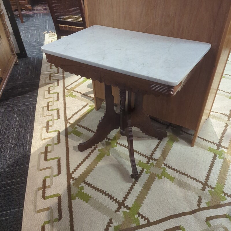 Victorian marble top table. 30in wide 20in deep 30in high.