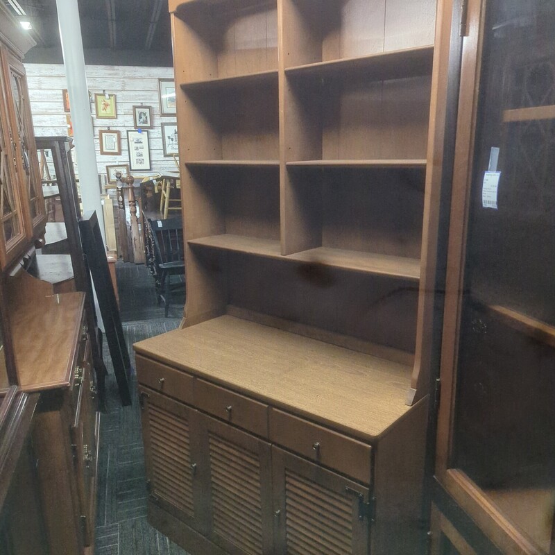 Ethan Allen cabinet with bookshelf top. 40in wide 17in deep 78in high.