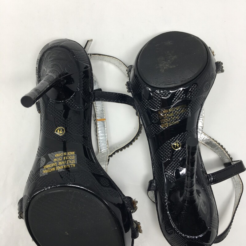 100-166 Wild Rose, Black, Size: 7.5
Black heels with sparkle lined straps
