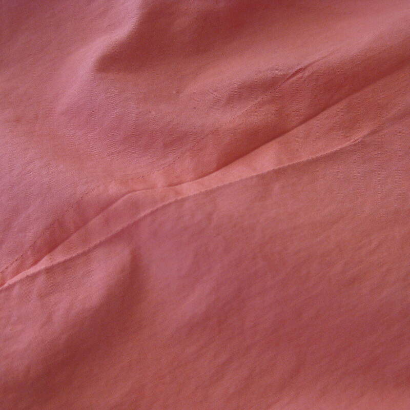 Super Cute coral blouse from the 50s with tiny white plastic buttons and pretty scalloped stitching at the upper chest.
Made by Judy Bond it doesn't have any fabric tags but I am certaint that it's cotton.
Short sleeves
No stretch
This blouse had two darts running from the hem up to the bust which have been let out.
This was VERY common practice in the olden days as people took very good care of the their clothes and the clothes were frequently designed to allow for changes in age/size/pregancy.  No such thing as fast fashion in those days!
Flat measurements:
Shoulder to shoulder: 16
Armpit to Armpit: 22
Length: 22.5
Waist: 18 - you could easily modify the fit on this blouse to be a little more form fittings by sewing up the darts mentioned above.

Excellent condition!

thanks for looking!
#1604