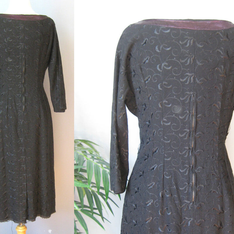 This black wool dress by DRA Original is trimmed with black satin and embroidered all over in black flowers.<br />
It's fitted sheath<br />
unlined<br />
It needs to be hemmed.<br />
Otherwise great condtion, with a thread of the embroidery pulled here and there.<br />
<br />
Here are the flat measurements, please double where appropriate:<br />
<br />
Waist: 15<br />
Hip: 19<br />
Armpit to Armpit: 19 1/2<br />
Underarm sleeve seam length: 16<br />
Length in current unhemmed state: 40.5<br />
<br />
Thank you for looking.<br />
#51279