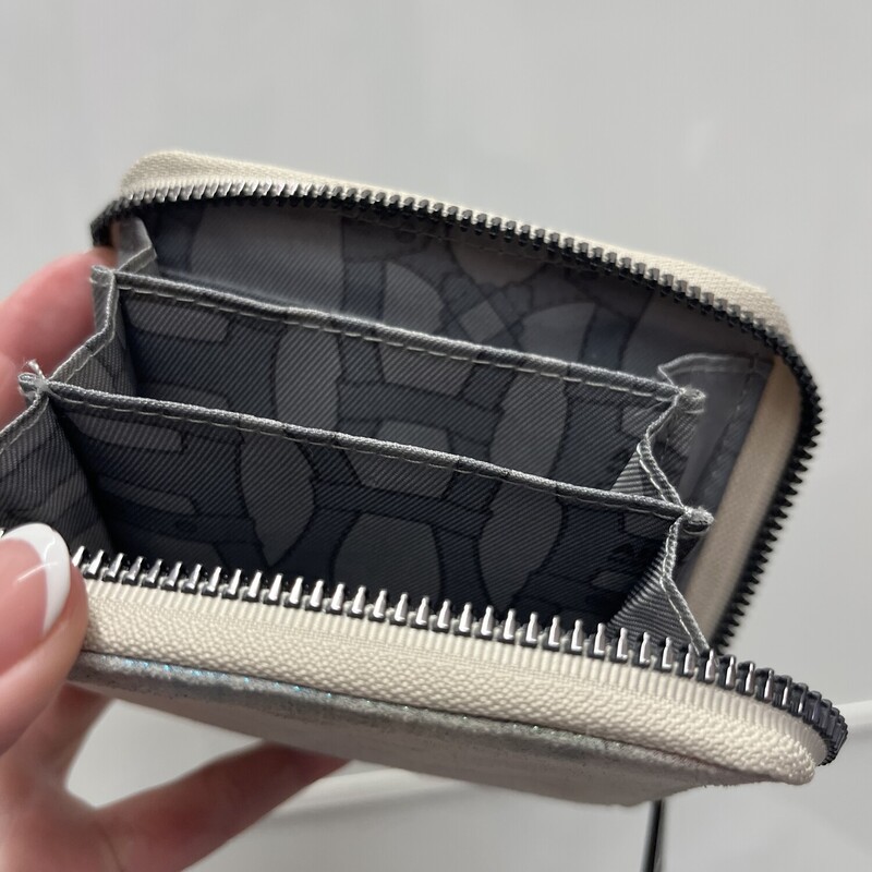 $85 Metallic Brushed Brixton Zip Around Wallet<br />
Measurements: 4 H x 5 W x 1 D<br />
in Brand NEW condition!!