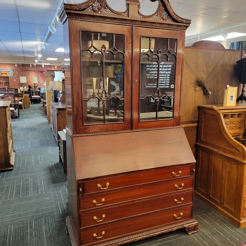 Massive Chinese Chippendale Mahogany Secretarys Desk with Ornate Carvings.  Solid Mahogany.  Comes apart into two pieces for easy transportation.  Measures 51' wide; 96 1/2' tall.