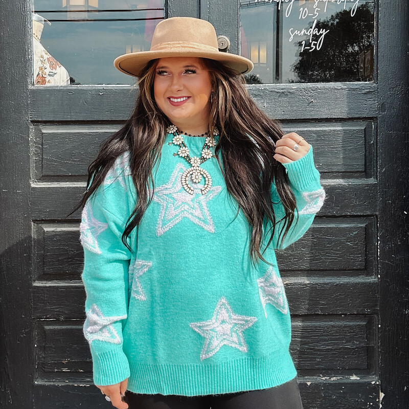 This SUPER soft sweater is perfect for the cooler weather! Bundle up and look stylish while doing it, Pair me with a super cute pair of distressed denim, or some leggings.. either way I will make you shine!
Available in two beautiful colors: Turqoise w/ Pink and Tomato Red with Turqoise.
Sizes small, medium, and large. Runs Oversized!

Madison is wearing a size Large.