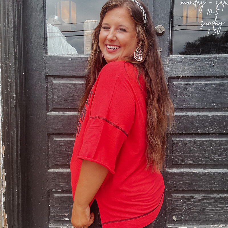 This super cute shirt is perfect for football season, dress it up or down! Rock your team colors in this cute top!<br />
 Available in Red, Orange, and Burgandy.