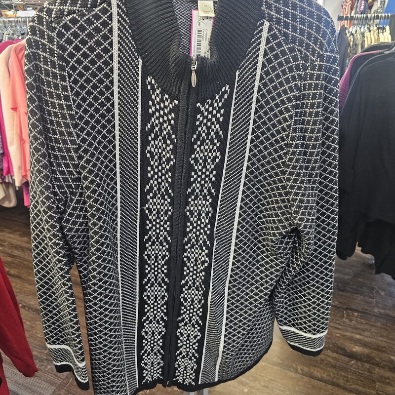 Zip up cardigan style sweater in black and white with long sleeves