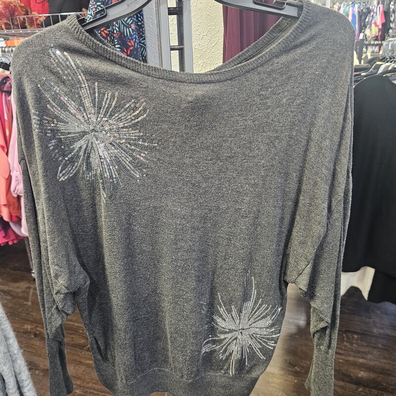 Long sleeve grey sweater that is lightweight and adorned with sequin design.