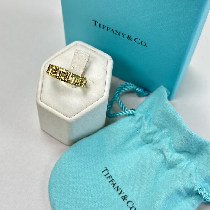 Tiffany & Co 18K Gold `T` True Wide Ring
Retails for $2,100!
Size 8