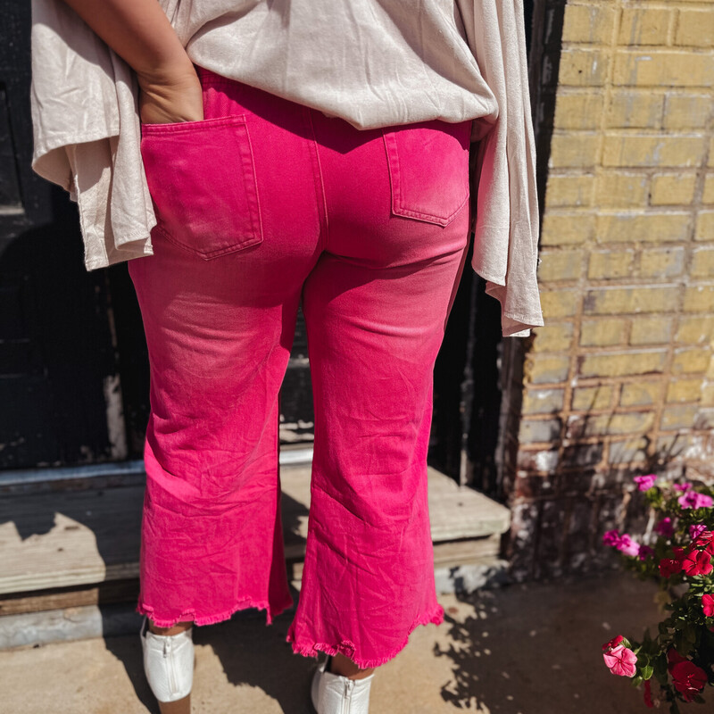 These Hot Pink distressed jeans are the perfect staple piece for football/fall season! Dress them up or down, you're sure to be the cutest around town!<br />
Available in sizes Small-XLarge.
