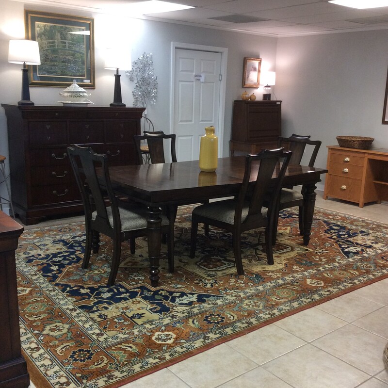 BARGAIN ALERT!
This diningroom set by Bernhardt Furniture is being sold in \"as is\" condition as it has seen some better days. The large table comes with 4 upholstered chairs. The set features a very dark wood finish and lovely carved details.