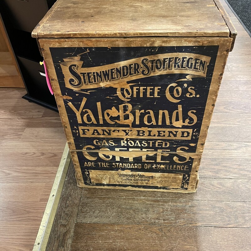 Yale Brand Coffee Crate
Size 15 1/2 wide x 13 1/2 deep x 21 tall
Steinwender-Stoffregen Coffee Co'original shipping crate for Yale Brands Coffee.  Nice paper advertising on three sides and on the inside of the lid.  It would make a great side table.