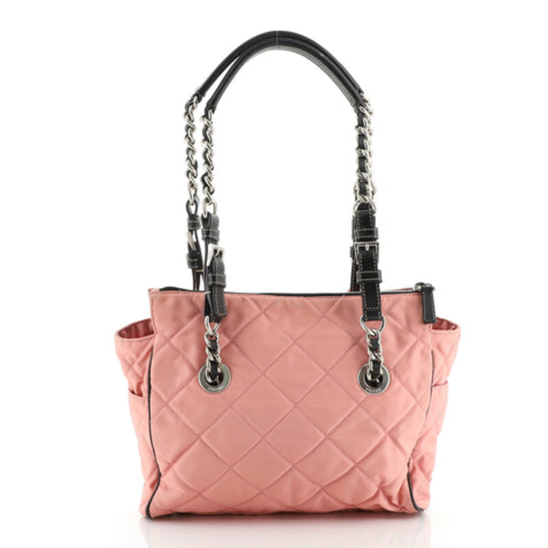 PRADA
PRE-OWNED PRADA PINK LEATHER NYLON CHAIN ZIP TOTE BAG
This is your opportunity to own this chic and stylish Prada Pink Quilted Nylon Shopping Tote Bag. This spacious tote has the capability to hold all your daily essentials. It is made of quilted nylon with leather straps entwined with silvertone chain links. Makes a perfect casual everyday bag!
Prada Pink Leather Nylon Chain Zip Tote Bag with silver-tone hardware, saffiano leather trim, and includes two exterior side-end pockets, Dual leather and chain shoulder/hand straps, Interior includes one large zippered pocket, zip, open closure.
 10\"W x 9\"H x 2.5\"D / 25.4 x 22.8 x 6.35 cm
This bag is in excellent condition.  Interior is spotless and the exterior shows very little signs of wear.