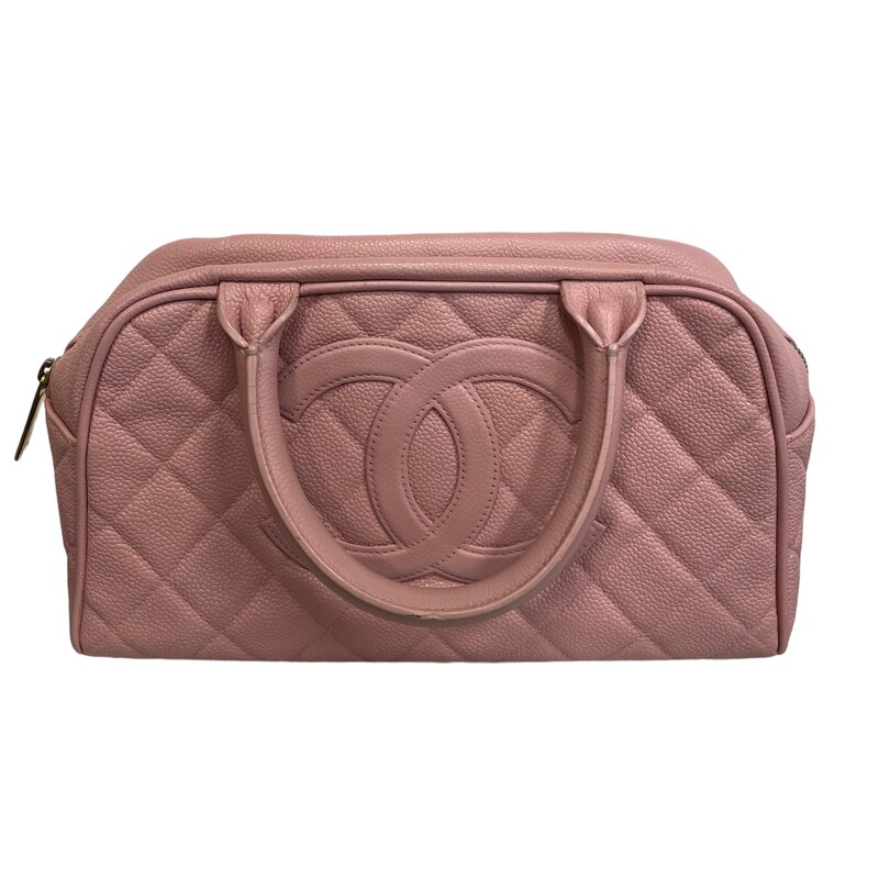 Chanel quilted pink caviar leather Bowling handbag, CC logo stitched to one side, slot pocket to the other, dual handles over zipper opening and tan lined interior with single zip pocket. Spacious interior to fit your daily essentials.<br />
Year: 2003-2004<br />
Dimensions:10Lengthx 6Height<br />
Some minor pen marks inside