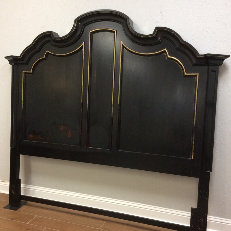 Add a little drama to your bedroom with this king-sized headboard by Staney Furniture!  It's being sold  \"as is\", so it;s a bargain as well. It has been painted black and distressed in antiqued gold. Very pretty.