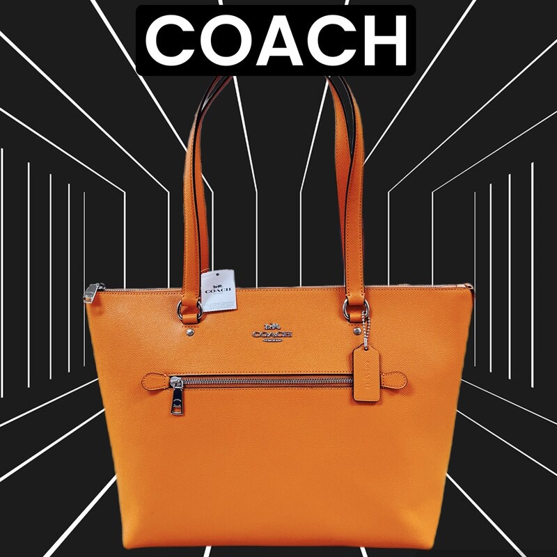 COACH - NEW w/tags
The Gallery tote is a zip-top design with pockets inside and out to store everyday needs.
Cross grain Leather
Inside zip, cell phone and multifunction pockets
Zip-top closure, fabric lining
Handles with 10 1/4\" drop
Outside zip pocket
12 3/4\" (L) x 10 1/2\" (H) x 5 1/2\" (W)
NO marks, flaws or stains