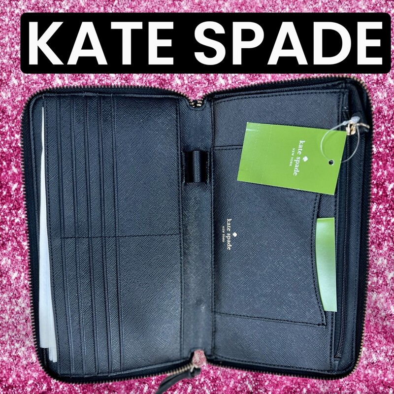 Kate Spade New York | Black & White Wilson Road French Stripe Kaden Wallet<br />
Stylishly stash your cards, cash and coins with the help of this luxe leather wallet made in a versatile solid shade<br />
8.7'' W x 5.3'' H x 0.8'' D<br />
Nylon / leather trim<br />
Lined<br />
Zip closure<br />
Interior: standard wallet pockets<br />
Exterior: one zip pocket<br />
Original Retail Price:  179.00<br />
New with Tags.  No marks or flaws.