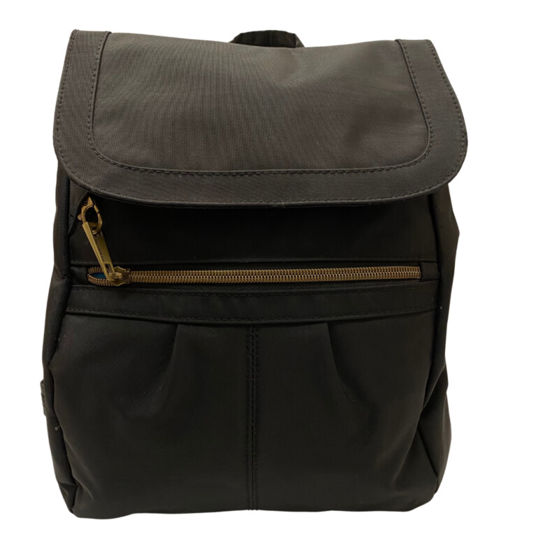 Travelon Anti-Theft Signature Backpack
Ample space to carry an iPad, 2 interior zippered wall pockets and a drop pocket. The backpack is made from durable water and stain resistant nylon material with antique brass finished hardware.