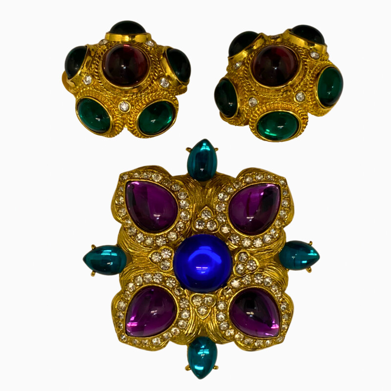 Collectible Joan Rivers Brooch and Earring Set<br />
Gold Tone with Jewel Colored Gems<br />
Clip On Earrings