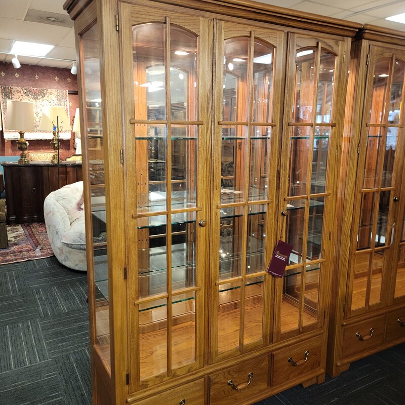 Gorgeous Thomasville Display Cabinet in excellent condition.  Qaulity made; well taken care of.   Has three drawers for storage and two doors to open; 3/8' thick plate glass shelves and beveled glassbon front and side doors.  Measures 54' wide; 19' deep; 80' tall.