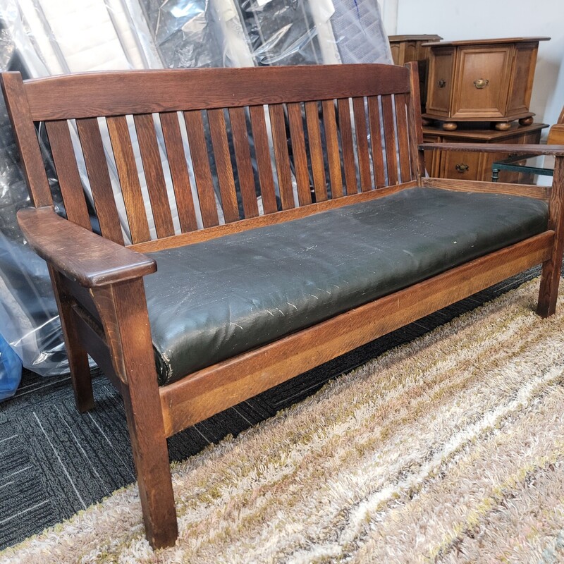 Antique Mission Oak Settee in good original condition.  This would be a great piece for restoration and putting in some tlc.   Measures 69' wide; 28' deep; 36' tall.